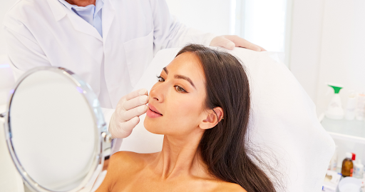 Woman receiving a cosmetic surgery consultation at Smith Plastic Surgery in Las Vegas, combining beauty and travel for aesthetic transformation