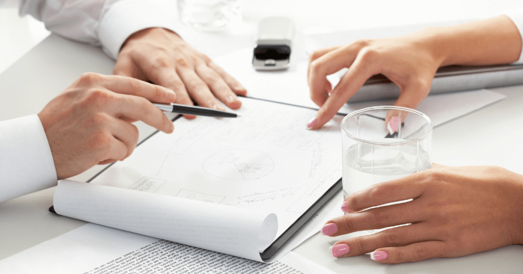 Patient and surgeon reviewing treatment options and asking questions during a plastic surgery consultation in Las Vegas